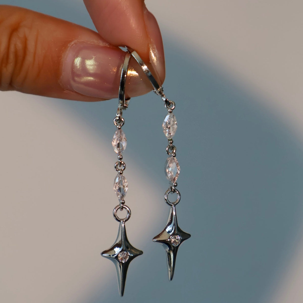 Dangly 18K Gold Star Plated Earrings